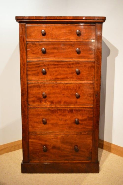A Good Mahogany Victorian Period Antique Wellington Chest by Holland & Sons