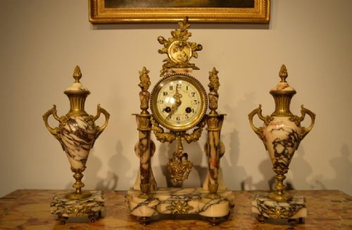 A French Late 19th Century White Veined Marble & Ormolu Clock Garniture