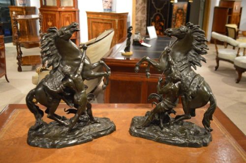 A Large Pair of Antique Bronze Marley Horses