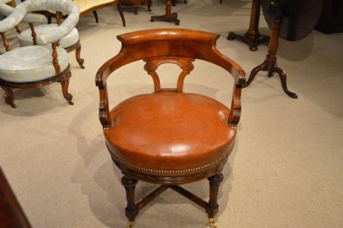 A Walnut & Leather Late Victorian Period Antique Revolving Desk Chair