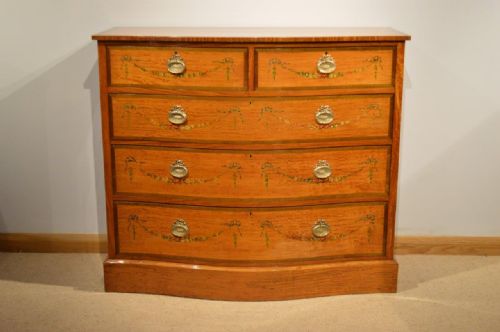 A Beautiful Satinwood Edwardian Period Serpentine Antique Chest of Drawers