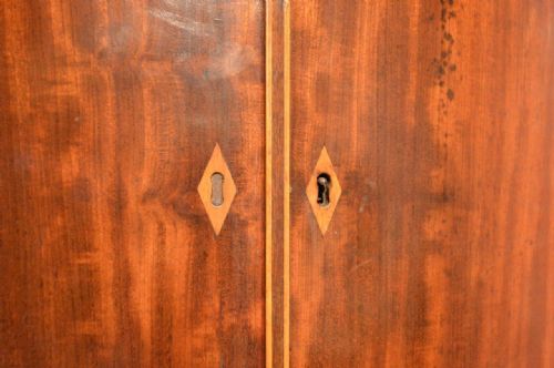 fig 1. A Mahogany George III Period Bow Front Corner Cupboard