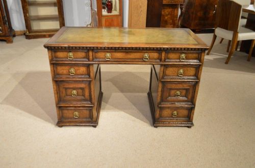 fig 1. A Jacobean Revival Distressed Solid Oak Knee Hole Desk