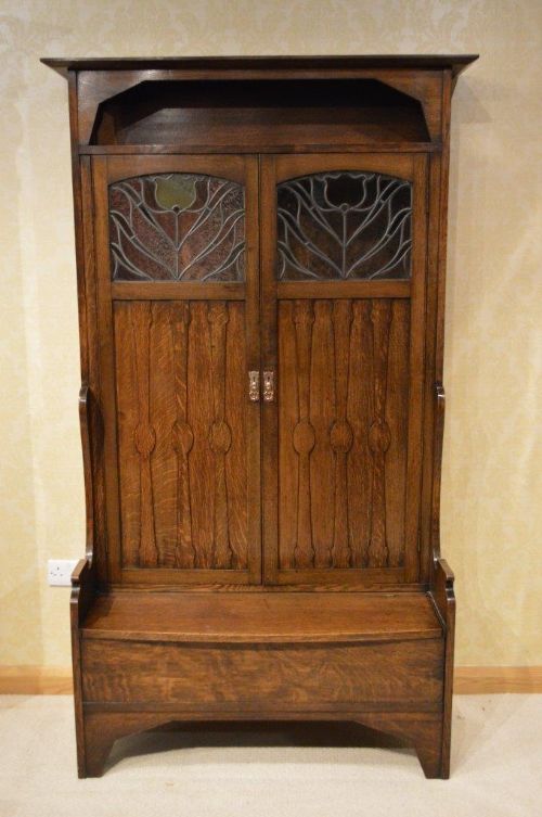 An Oak Arts & Crafts Period Hall Bench/cupboard