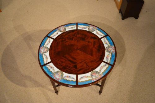 fig 1. A Fine Quality Mahogany Late 19th Century Table With Sevres Panels