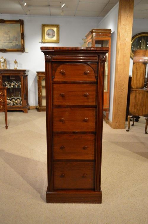 A Mahogany Early Victorian Period Antique Wellington Chest