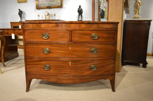 A Mahogany Regency Period Bow Front Chest of Drawers