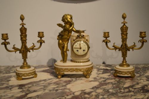 A Marble & Ormolu Mounted French Clock Garniture
