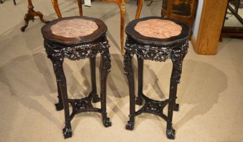 A Large Pair of Hardwood & Marble Inset Chinese Stands