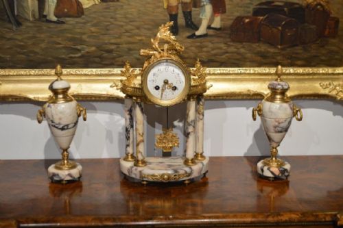 A French 19th Century Marble & Ormolu Clock Garniture