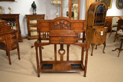 An Oak Arts & Crafts Period Stick/umbrella Stand by Shapland & Petter of Barnstaple