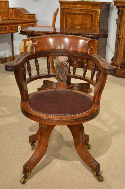 A Walnut Victorian Period Revolving Desk Chair