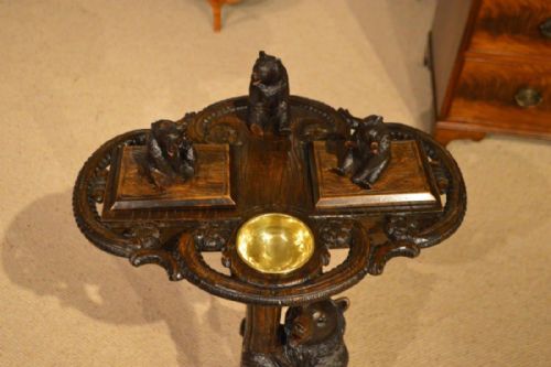 fig 1. A charming black forest carved smokers table