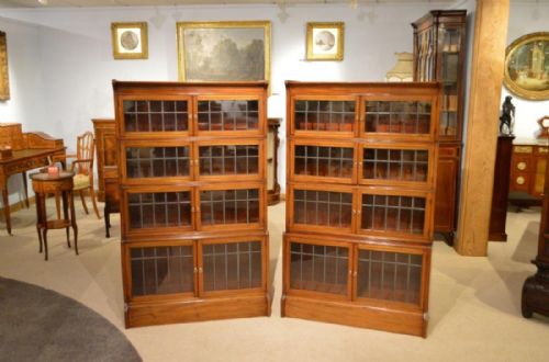 A Good Pair of "Oxford" Edwardian Period Sectional Bookcases by William Baker.