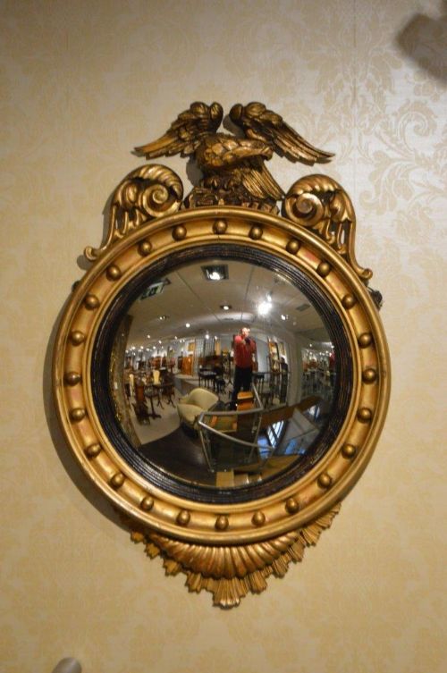 A Gilt-wood Regency Period Eagle Convex Mirror