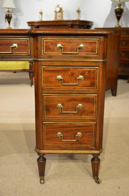 fig 1. A mahogany and brass mounted Late Victorian Period pedestal desk by Bertram & Sons, Oxford Street, London.