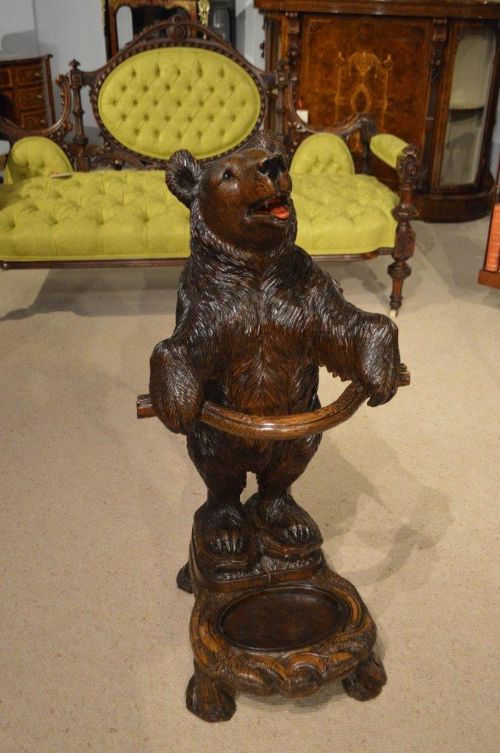 A Finely Carved Black Forest Linden Wood Bear Stick Stand