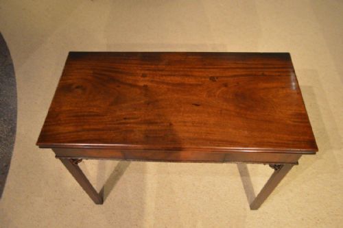 fig 1. A fine cuban mahogany George II Period antique card table by Phillip Bell of London
