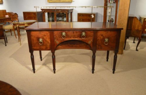 fig 1. A mahogany Regency Period brass inlaid antique sideboard.