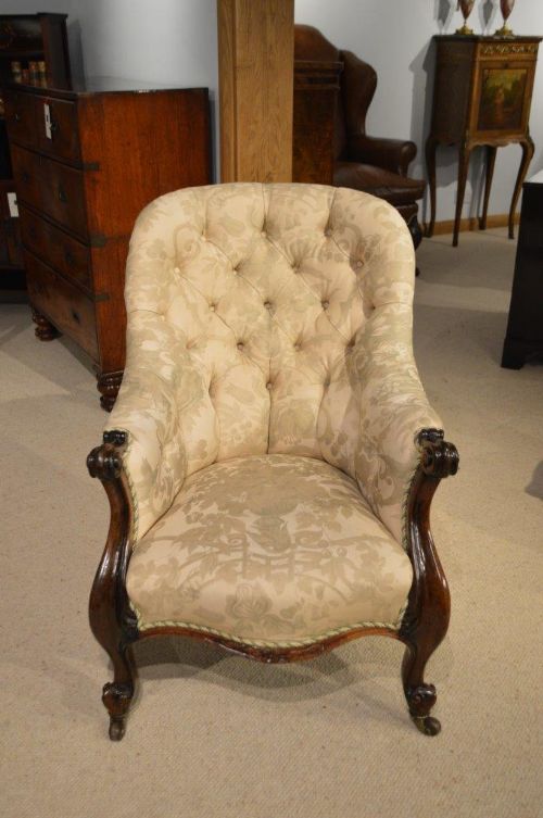A Rosewood Victorian Period Antique Armchair.