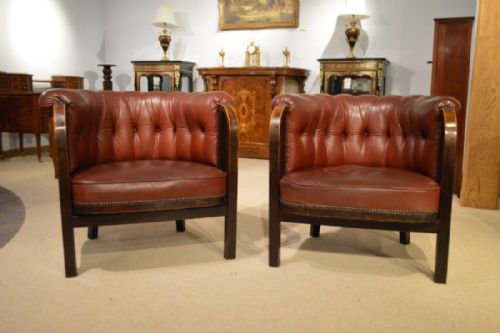 fig 1. A large pair of Art Deco Period oak and leather gentleman's club armchairs