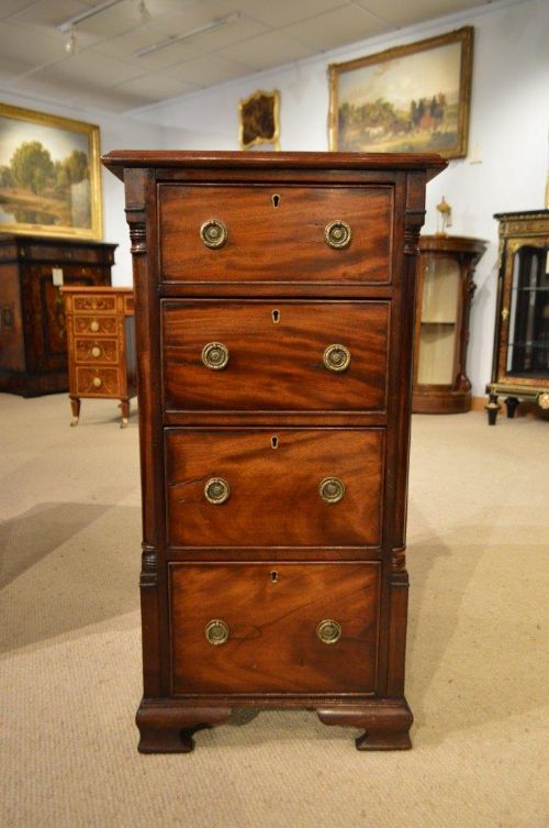 fig 1. A pair of mahogany 19th Century antique bedside chests