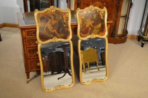 A Fine Pair of Carved Gilt Wood and Vernis Martin Pier Mirrors