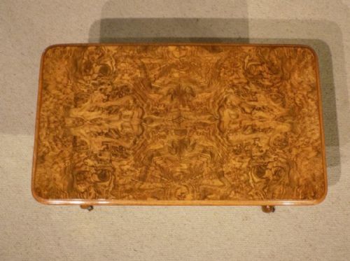 fig 1. A small burr walnut Victorian Period rectangular antique coffee table