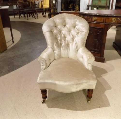 A Victorian Period Deep Buttoned Nursing Chair by Gillows of Lancaster.