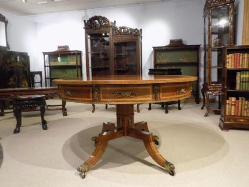 fig 1. A rosewood and satinwood Regency Period antique circular drum table