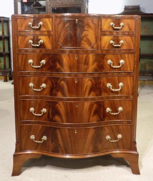 A Beautiful Flame Mahogany Edwardian Period Serpentine Antique Chest of Drawers