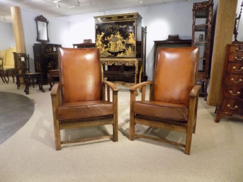 A Good Pair of Oak and Leather Art Deco Period Reclining Armchairs