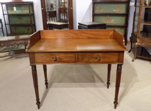 A Mahogany William IV Period Two Drawer Hall Table