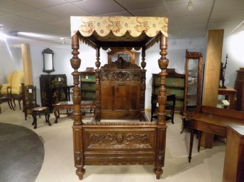 A Finely Carved Italian Baroque Walnut Four Poster Single Bed