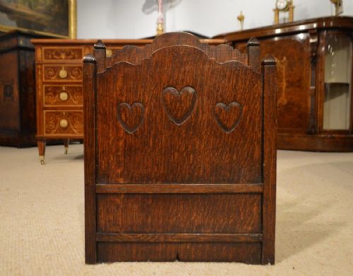 An Oak Arts & Crafts Period Magazine Rack Possibly by Liberty's.