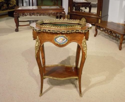 A French 19th Century Kingwood Jardiniere with Sevres Plaques Signed Vervelle Audot