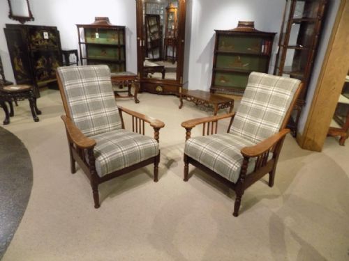 A Good Pair of Oak Arts & Crafts Period Reclining Armchairs