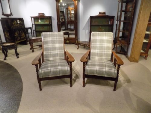 fig 1. A good pair of oak Arts & Crafts Period reclining armchairs