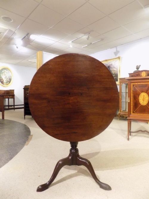 A Mahogany George III Period Tilt Top Tripod Table.