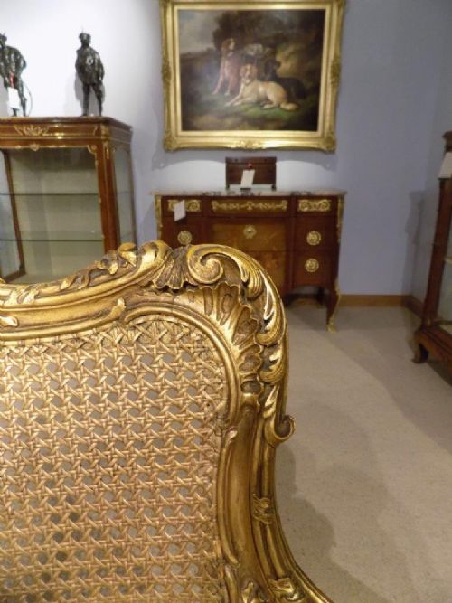 fig 1. A Late 19th Century French carved gilt wood and bergere canapé