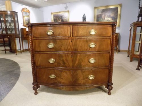 A Beautiful Scottish Regency Period Flame Mahogany Bow Front Chest of Drawers.