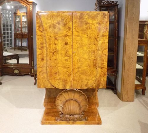 A Stunning Quality Burr Walnut Art Deco Period Cocktail Cabinet by Hille & Co of London.