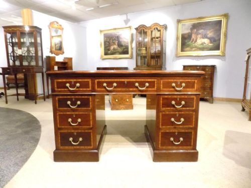 fig 1. A fine quality mahogany & satinwood inlaid Edwardian Period pedestal desk.