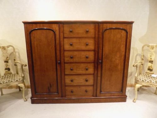 A Mahogany Victorian Period Gentleman's Combination Linen Press.