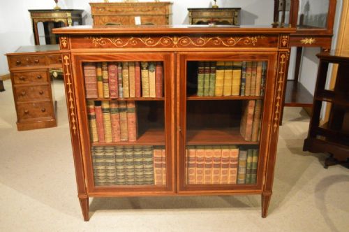 A Fine Quality Marquetry Inlaid Edwardian Period Two Door Bookcase Probably by Edwards & Roberts of London.