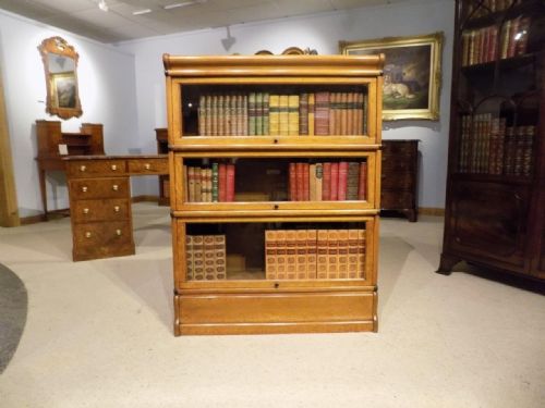An Oak Edwardian Three Stacking Bookcase by Globe Wernicke