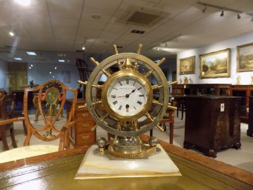 A Rare Novelty Nautical Revolving Ships Wheel Desk Clock/barometer