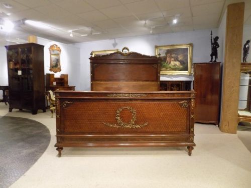 A Fine Quality Plum Pudding Mahogany and Ormolu Mounted French Kingsize Bed