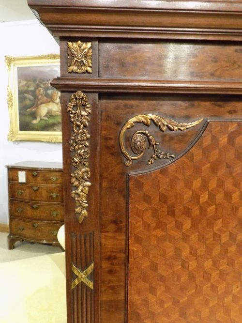 fig 1. A Fine quality plum pudding mahogany and ormolu mounted French kingsize bed