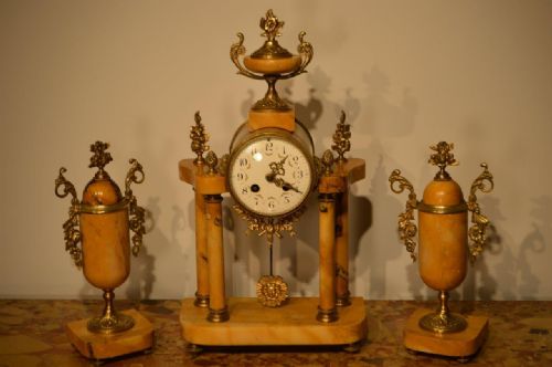 A French Sienna Marble & Ormolu Mounted Antique Clock Set.